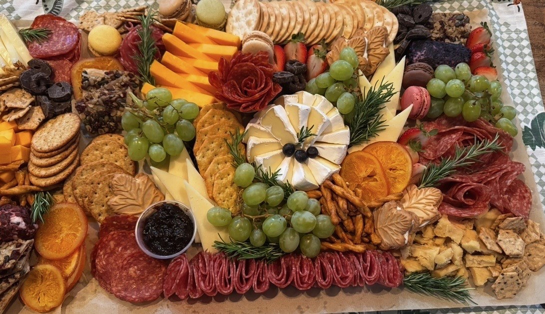 Artisan charcuterie board with brie centerpiece