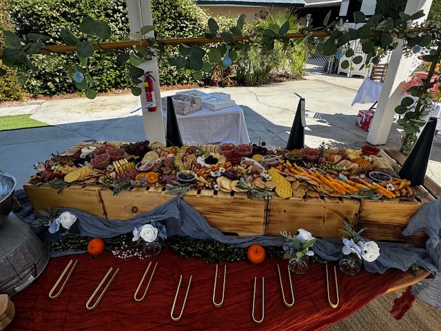 Overhead view of charcuterie grazing table in Temecula